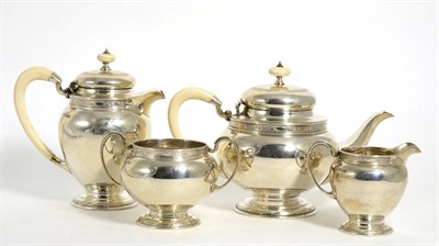 Lot 822 - A George V Silver Four Piece Tea Service, Mahoah Rhodes, Sheffield, 1930, circular with a band...