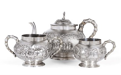 Lot 827 - An Indian White Metal Three Piece Tea Service, late 19th/early 20th century, decorated in...