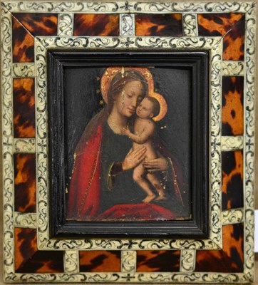 Lot 987 - Follower of Hans Membling (1430-1494)  Madonna and Child Oil on panel, contained in an incised bone