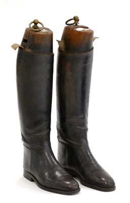 Lot 1039 - A Pair of Black Leather Riding Boots, with wooden trees marked 'Tristram Calcutta'