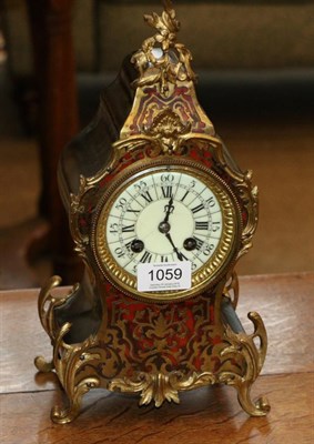 Lot 1059 - A ";Boulle"; Striking Mantel Clock, circa 1910, scroll gilt metal mounts, enamel dial, twin...