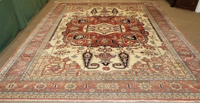 Lot 1102 - Good Heriz Carpet Iranian Azerbaijan, 20th century The cream field of angular vines centred by...