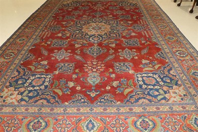 Lot 1108 - Tabriz Carpet Iranian Azerbaijan, circa 1930 the blood red field of stylised flowerheads centred by