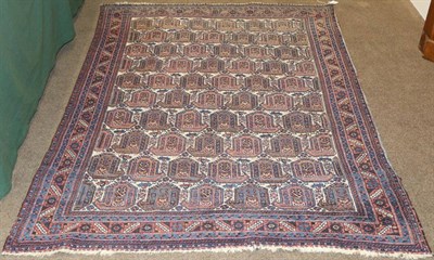 Lot 1109 - Afshar Rug South East Iran, circa 1930 The cream field with rows of boteh framed by stepped...