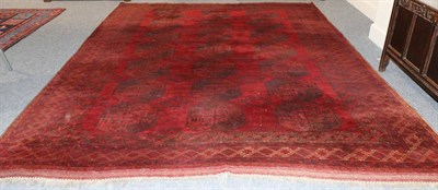 Lot 1116 - Turkmen Carpet North West Anatolia, 1910 The claret field with three rows of elephant foot guls...