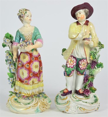 Lot 5 - A Pair of Derby Porcelain Figures of The Seasons, circa 1770, Spring as a girl holding a basket...