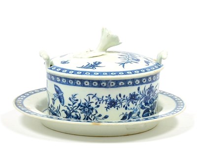 Lot 14 - A Worcester Porcelain Butter Tub, Cover and Stand, circa 1775, printed in underglaze blue with...