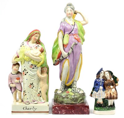 Lot 45 - A Staffordshire Pearlware Figure of Diana, early 19th century, the goddess standing holding a...