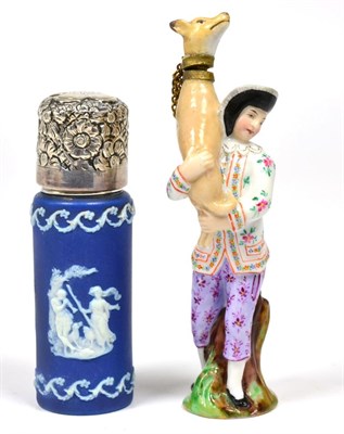 Lot 84 - A Continental Porcelain Figural Scent Flask, in 18th century style, as a youth holding a greyhound