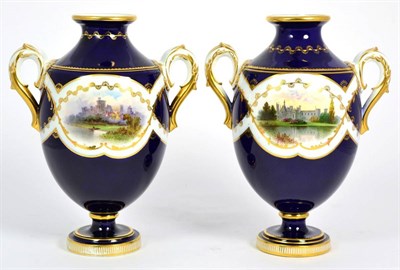 Lot 99 - A Pair of Mintons Porcelain Twin-Handled Vases, circa 1900, of ovoid form with flared necks,...