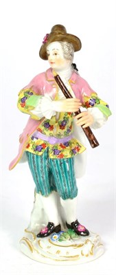 Lot 116 - A Meissen Porcelain Figure of a Flautist, 20th century, standing in 18th century costume on a...