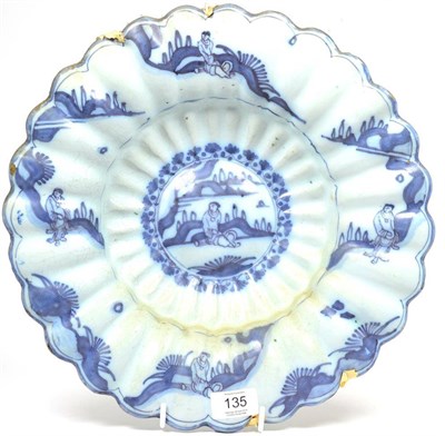 Lot 135 - A Delft Lobed Dish, circa 1690, painted in blue with chinoiserie figures in transitional style...