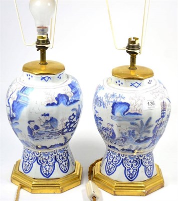 Lot 136 - A Pair of Delft Octagonal Baluster Vases, 18th century, painted in blue and manganese with...