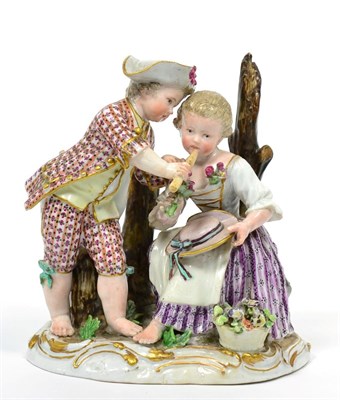 Lot 141 - A Marcolini Meissen Porcelain Figure Group, circa 1780, as a boy holding a pipe to the lips of...