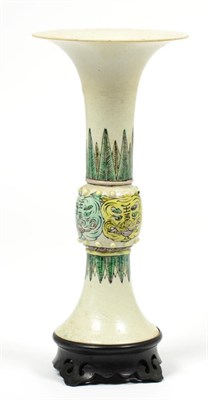 Lot 178 - A Chinese Bisque Porcelain Gu Shaped Vase, in Kangxi style, painted in famille verte enamels...