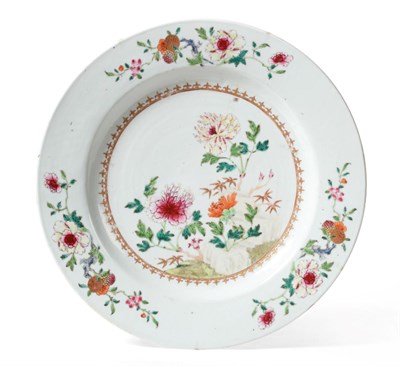 Lot 186 - A Chinese Porcelain Dinner Service, Qianlong, painted in famille rose enamels with peony and...