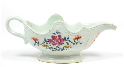 Lot 188 - A Chinese Porcelain Sauce Boat, Qianlong, of silver shape with strap handle, painted in famille...