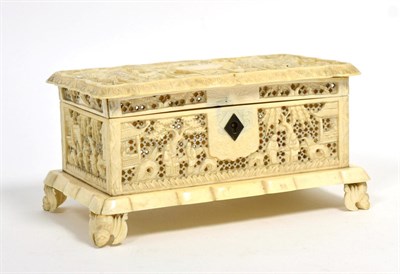 Lot 207 - A Cantonese Ivory Casket, mid 19th century, the hinged cover carved with a vacant cartouche and...