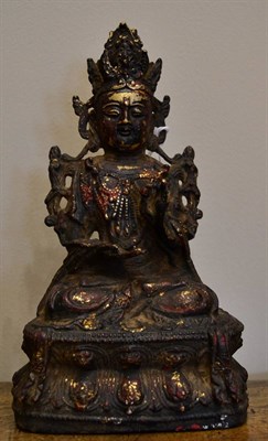 Lot 220 - A Chinese Bronze Figure of Bodhisattva, probably 16th/17th century, seated, the left hand...