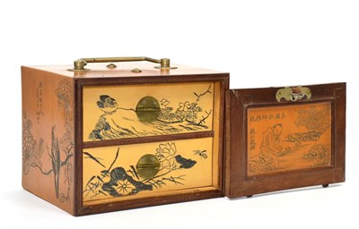 Lot 237 - A Chinese Travelling Small Chest, late 19th century, enclosing two drawers, the whole incised...