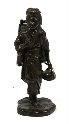 Lot 247 - A Japanese Bronze Figure of a Girl, Meiji period, in traditional dress holding a kettle in her left