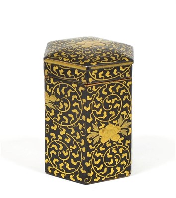 Lot 248 - A Japanese Lacquered Papier Mâché Hexagonal Box and Cover, 19th century, gilt with scrolling...