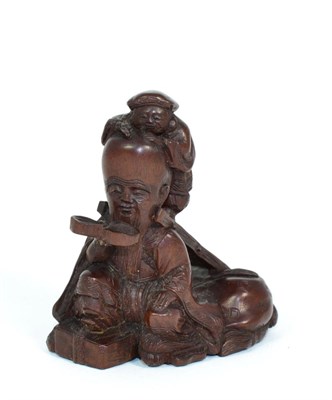 Lot 252 - A Japanese Carved Wood Netsuke, Meiji period, as Daikoku and Fukurokujin, 6cm high