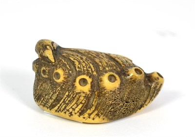 Lot 254 - A Japanese Horn Netsuke, early 20th century, carved as a rat on a sea creature, 7cm long