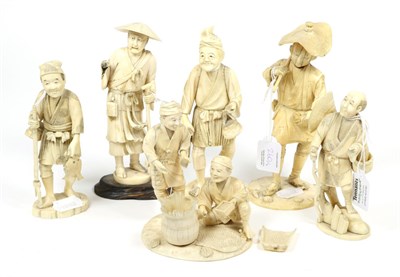 Lot 260 - A Japanese Ivory Okimono, Meiji period, as a farmer carrying a hoe, 20cm high; A Similar...