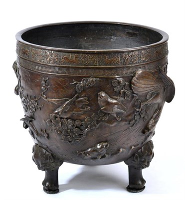 Lot 265 - A Japanese Bronze Jardinière, Meiji period, of ovoid form cast with birds amongst foliage, on...