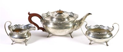 Lot 278 - A Three Piece Silver Tea Service, Alexander Clark, Birmingham 1923, oval with foliate pierced...