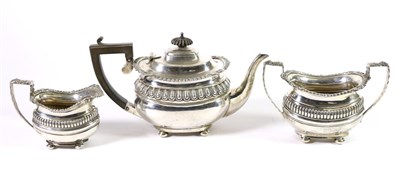 Lot 280 - An Edwardian Silver Three Piece Bachelor's Tea Service Nathan & Hayes, Chester 1904, rounded...