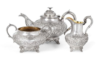 Lot 290 - A Matched Victorian Silver Three Piece Tea Service, the teapot and sugar bowl John Welby,...