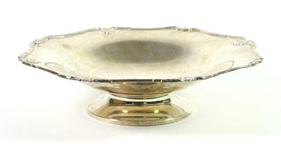 Lot 297 - A Scottish Shaped Circular Pedestal Dish, Hamilton & Inches, Edinburgh 1933, with foliate shell and