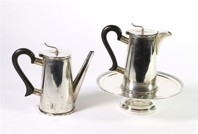 Lot 307 - A Pair of Silver Cafe au Lait Pots, Walker & Hall, Sheffield 1920, plain tapering form with faceted