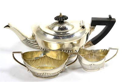 Lot 309 - An Edwardian Silver Three Piece Bachelor's Tea Service, William Devenport, Birmingham 1903, of oval