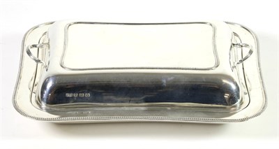 Lot 318 - A Silver Entree Dish and Cover, Roberts & Belk, Sheffield 1938, rectangular with rounded...