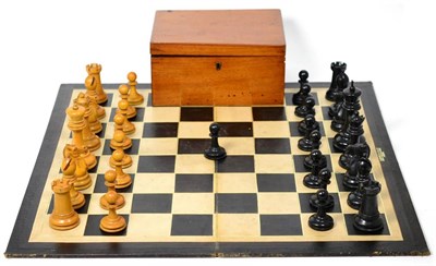 Lot 371 - A Jaques Staunton Pattern Ebonised and Natural Wood Chess Set, kings 10cm high, with associated...