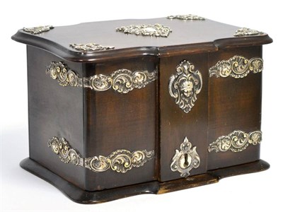 Lot 383 - A Victorian White Metal Mounted Mahogany Stationery Box, applied with scrolls, masks and cartouche