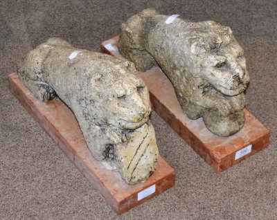 Lot 390 - A Pair of Italian Carved Stone Heraldic Lions, both outstretched, one modelled with its paws on...