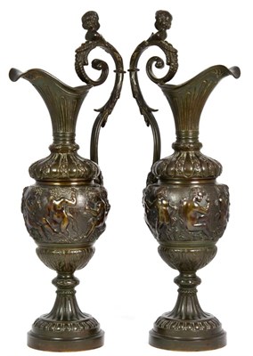 Lot 401 - A Pair of Bronze Ewers, in Renaissance style, of baluster form, the high scroll handles with cherub