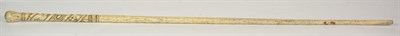 Lot 416 - A Whalebone Walking Stick, mid 19th century, the handle carved with flowerheads and strapwork, 89cm