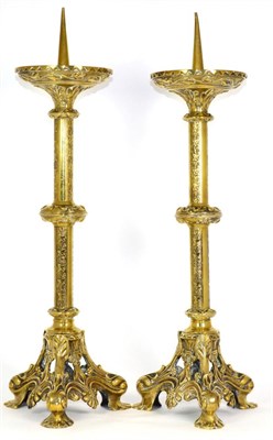 Lot 421 - A Pair of Brass Pricket Candlesticks, mid 19th century, with foliate cast circular drip pan,...