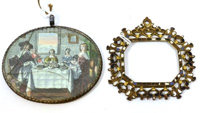 Lot 430 - A Steel Framed Pendant Hand Mirror, late 17th century, the reverse with colour engraving...