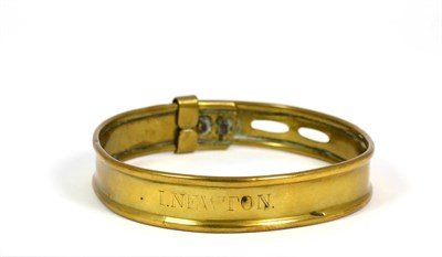 Lot 460 - A Brass Dog Collar, mid 19th century, inscribed I NEWTON within rolled borders, 9.5cm diameter