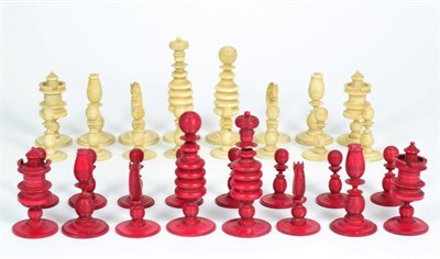 Lot 462 - A 19th Century Stained and Natural Ivory Chess Set, king 8cm high