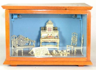 Lot 466 - A Prisoner of War Work Fret Carved Bone Miniature Salon Suite, 19th century, with foliate and...