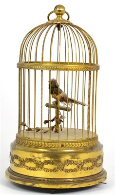 Lot 472 - A Birdcage Automaton, early 20th century, the domed cage enclosing a single bird perched on a...