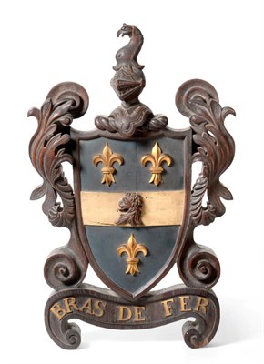 Lot 481 - A Victorian Carved and Painted Oak Armorial, surmounted by a bird and helmet crest, the shield...