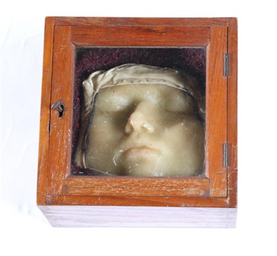 Lot 518 - A Wax Death Mask of a Girl, possibly 18th century, contained in a glazed box, 21.5cm wide overall